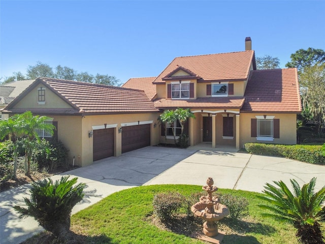 view of front of home with a garage