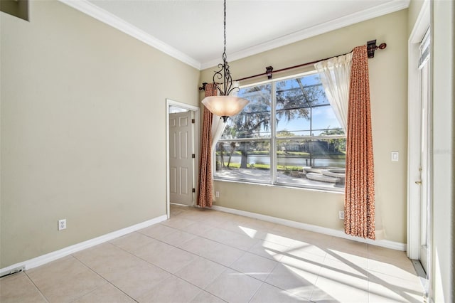 unfurnished dining area with ornamental molding, a water view, and light tile patterned floors