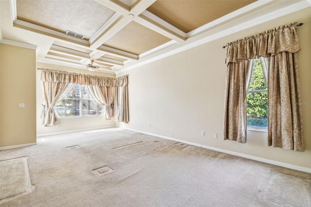 spare room with carpet floors, ornamental molding, coffered ceiling, and beam ceiling