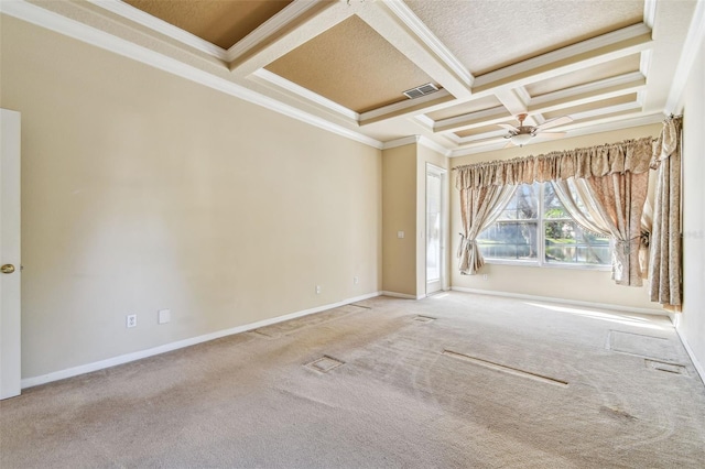 unfurnished room with coffered ceiling, crown molding, beamed ceiling, ceiling fan, and carpet