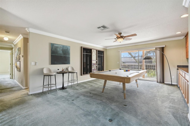 game room with crown molding, carpet floors, and ceiling fan