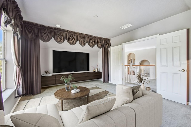 living room with light colored carpet