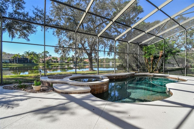 view of swimming pool with an in ground hot tub, a water view, a lanai, and a patio