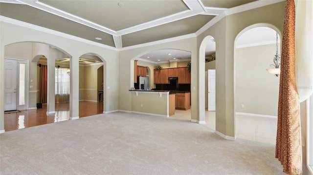2024 Capri Ln, Mount Dora, FL 32757 - unfurnished living room featuring light colored carpet, crown molding, and recessed lighting