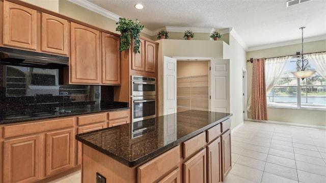 2024 Capri Ln, Mount Dora, FL 32757 - kitchen featuring double oven, decorative backsplash, ornamental molding, light tile patterned floors, and black stovetop