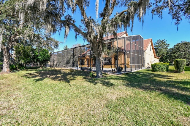 2024 Capri Ln, Mount Dora, FL 32757 - view of grassy yard featuring a lanai