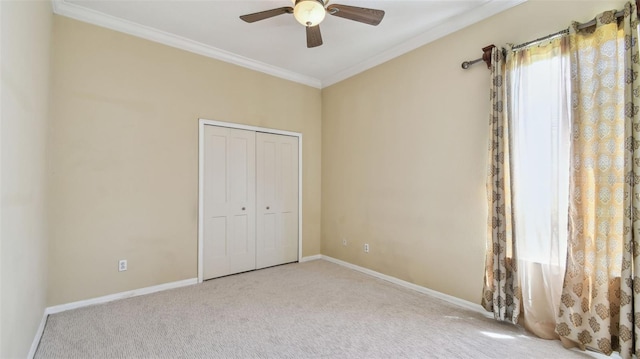 2024 Capri Ln, Mount Dora, FL 32757 - unfurnished bedroom with carpet flooring, crown molding, a closet, and ceiling fan