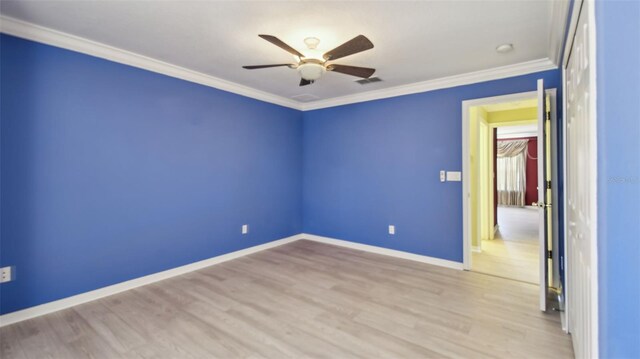 2024 Capri Ln, Mount Dora, FL 32757 - empty room with ceiling fan, light wood-style floors, and crown molding