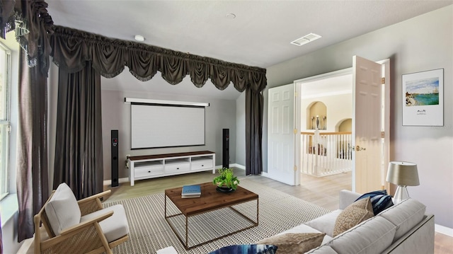 2024 Capri Ln, Mount Dora, FL 32757 - home theater room featuring baseboards and wood finished floors