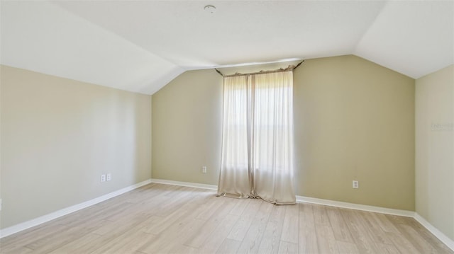 2024 Capri Ln, Mount Dora, FL 32757 - additional living space with vaulted ceiling and light wood-style floors