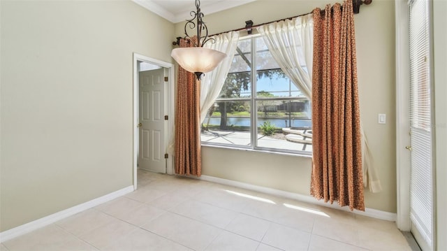 2024 Capri Ln, Mount Dora, FL 32757 - unfurnished dining area with a water view and light tile patterned flooring