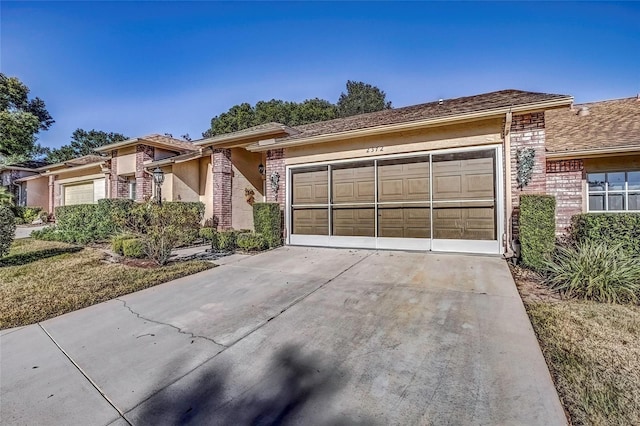 ranch-style house featuring a garage