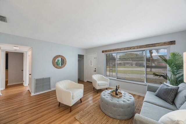 living room with hardwood / wood-style floors