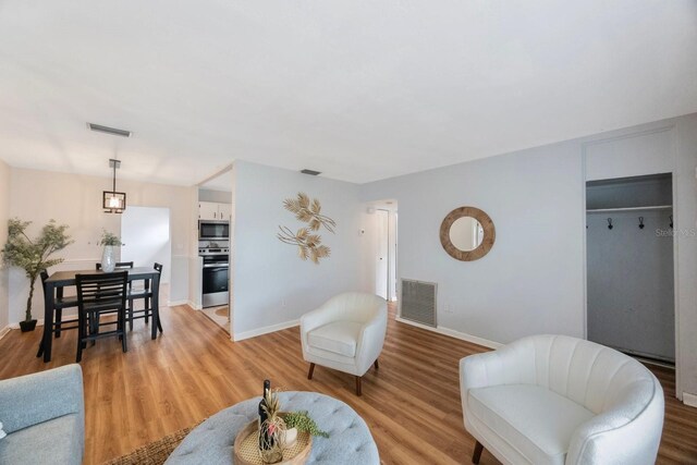 living room featuring light hardwood / wood-style flooring