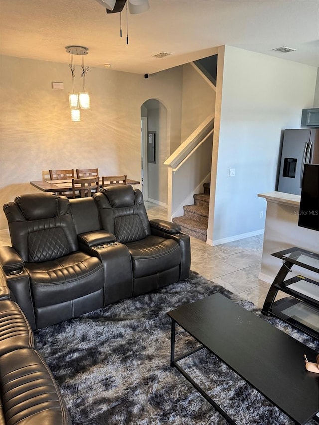 living room with ceiling fan