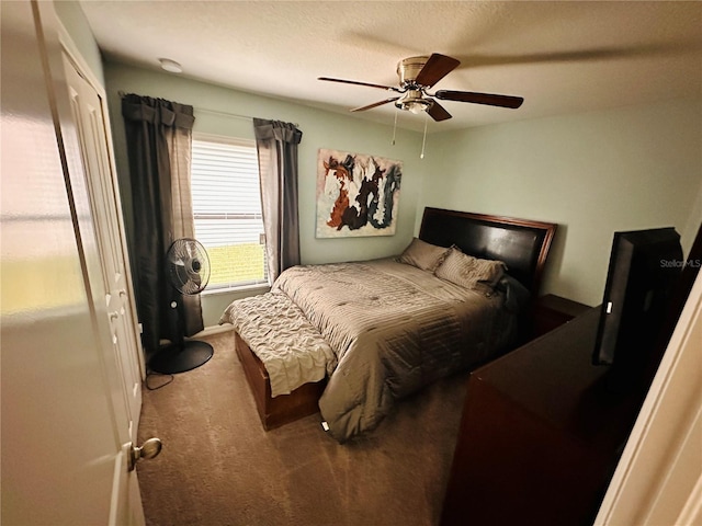 bedroom featuring carpet flooring and ceiling fan