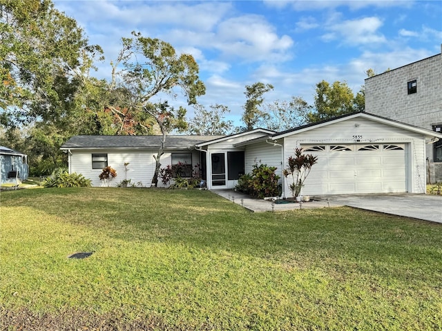 single story home featuring a garage and a front lawn