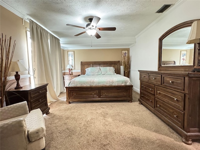 carpeted bedroom with ceiling fan, crown molding, and a textured ceiling