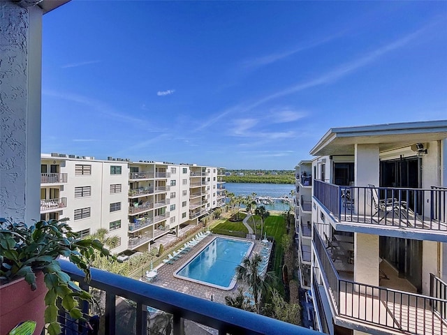 balcony featuring a water view