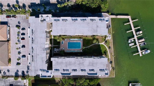 birds eye view of property featuring a water view