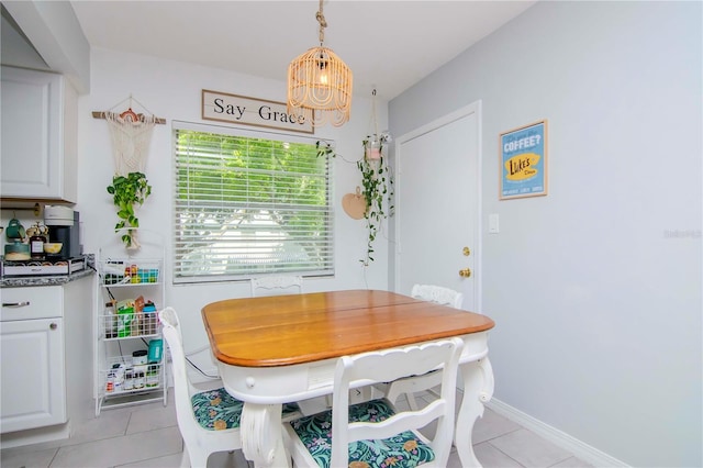 dining space with light tile patterned floors