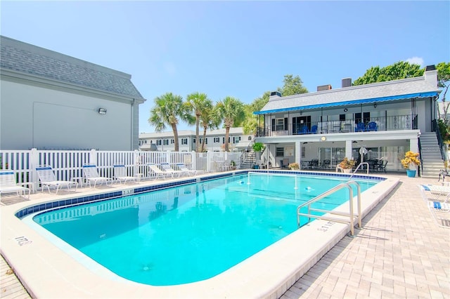 view of swimming pool featuring a patio