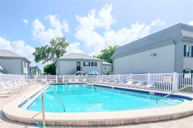 view of swimming pool featuring a patio