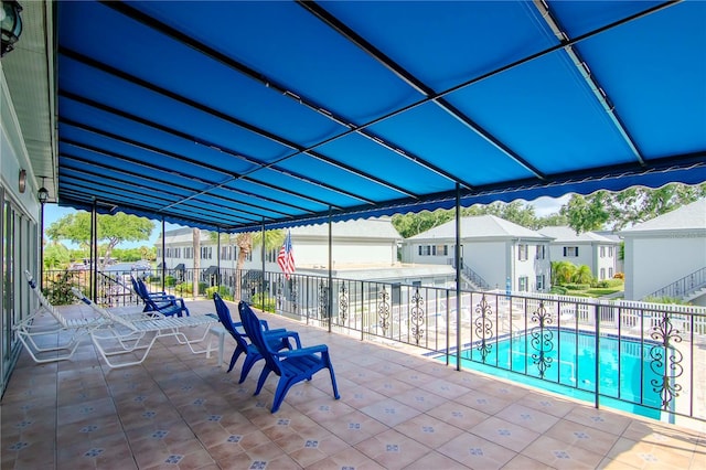 view of patio featuring a community pool