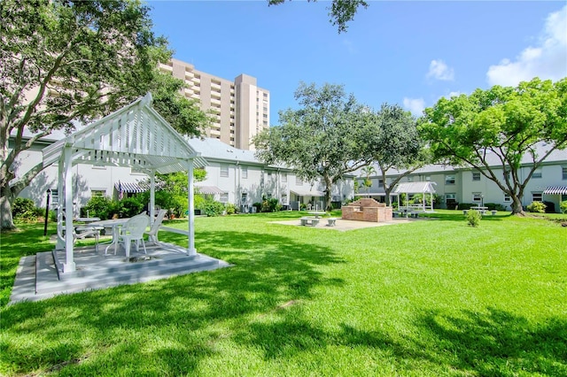 exterior space with a lawn and a patio