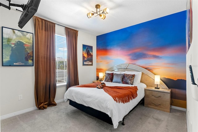 bedroom featuring light carpet