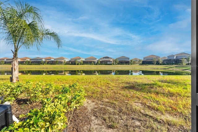 view of yard with a water view