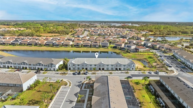 drone / aerial view with a water view