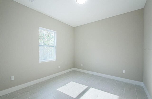 view of tiled spare room