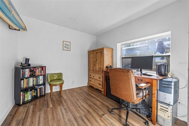 office area with hardwood / wood-style flooring