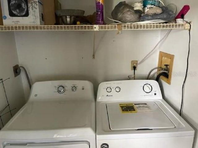 laundry room featuring laundry area and washing machine and dryer