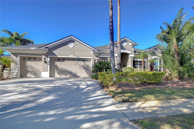 view of front of property featuring a garage