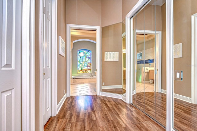 foyer entrance with hardwood / wood-style flooring