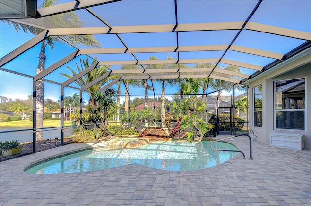 view of pool with a lanai and a patio