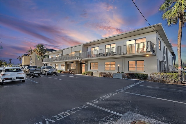 view of outdoor building at dusk