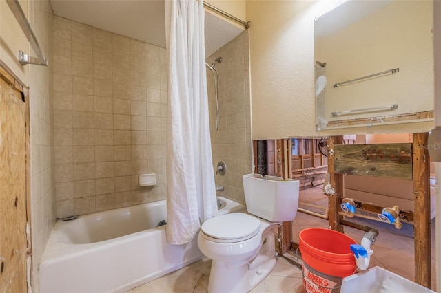 bathroom featuring tile patterned floors, shower / bath combo, and toilet