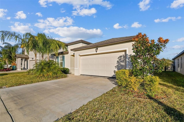 view of front of home featuring a front yard and a garage