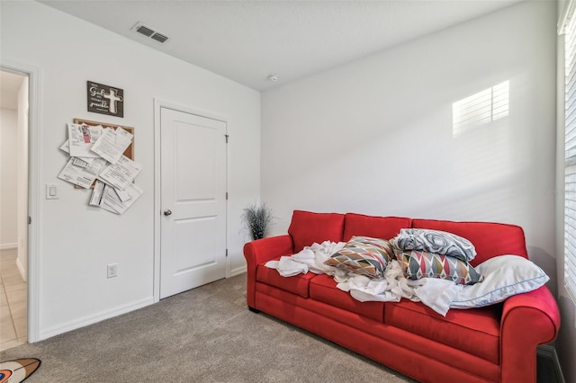 living area with carpet flooring