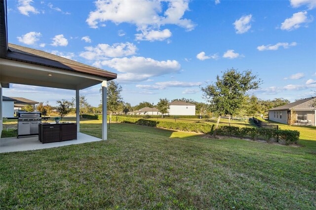 view of yard with a patio area