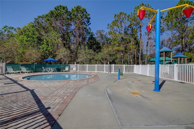 view of pool featuring a patio