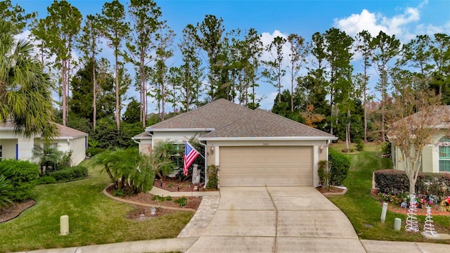 view of front of property featuring concrete driveway, a front lawn, an attached garage, and a shingled roof