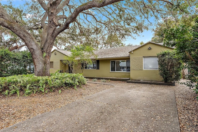 single story home with stucco siding