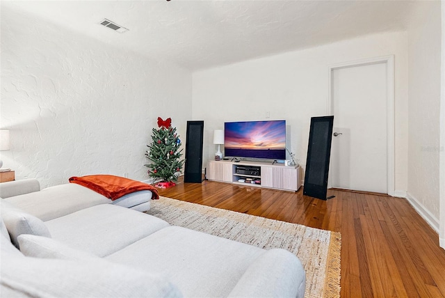 living room with wood-type flooring