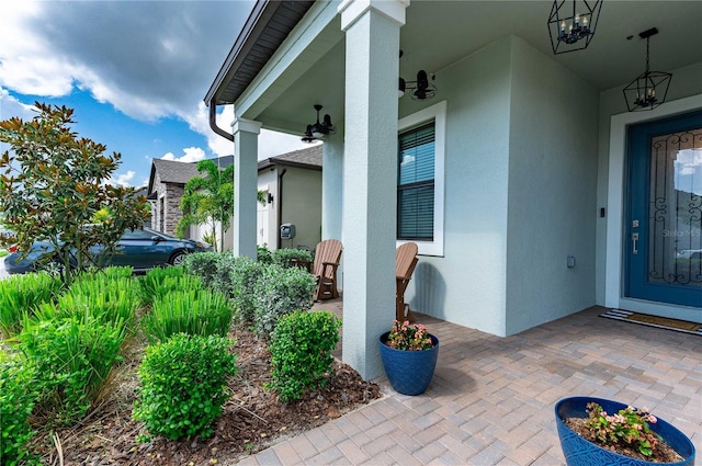 entrance to property featuring a porch