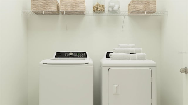 laundry area with washer and dryer