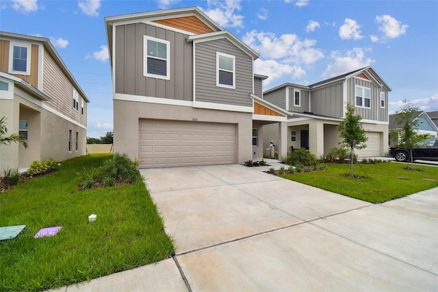 view of front facade featuring a front yard and a garage